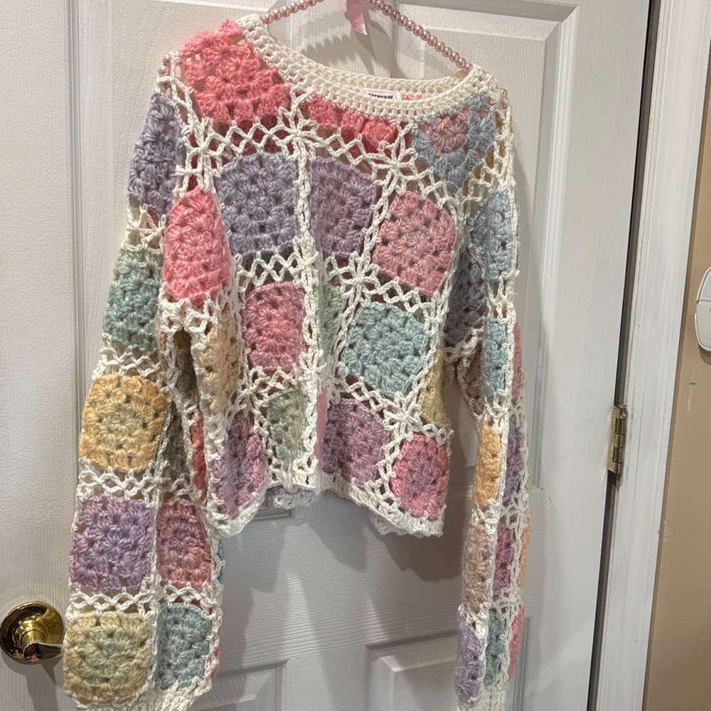 Rareraw is women’s short pastel granny square sweater